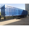 MK Blue box semi-trailer transporting cargo